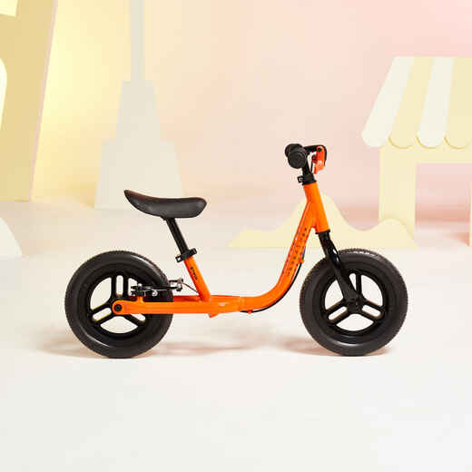 
      Kids' 10" Balance Bike Runride 500 - Orange/Black
  