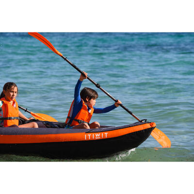 Image of 3 persons using stand-up paddles