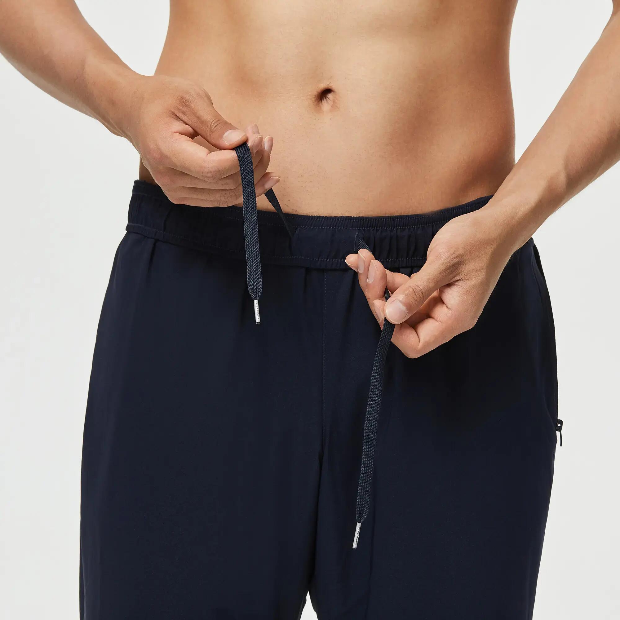 Pantalón chándal fitness  Hombre Domyos 120 azul marino 3/8