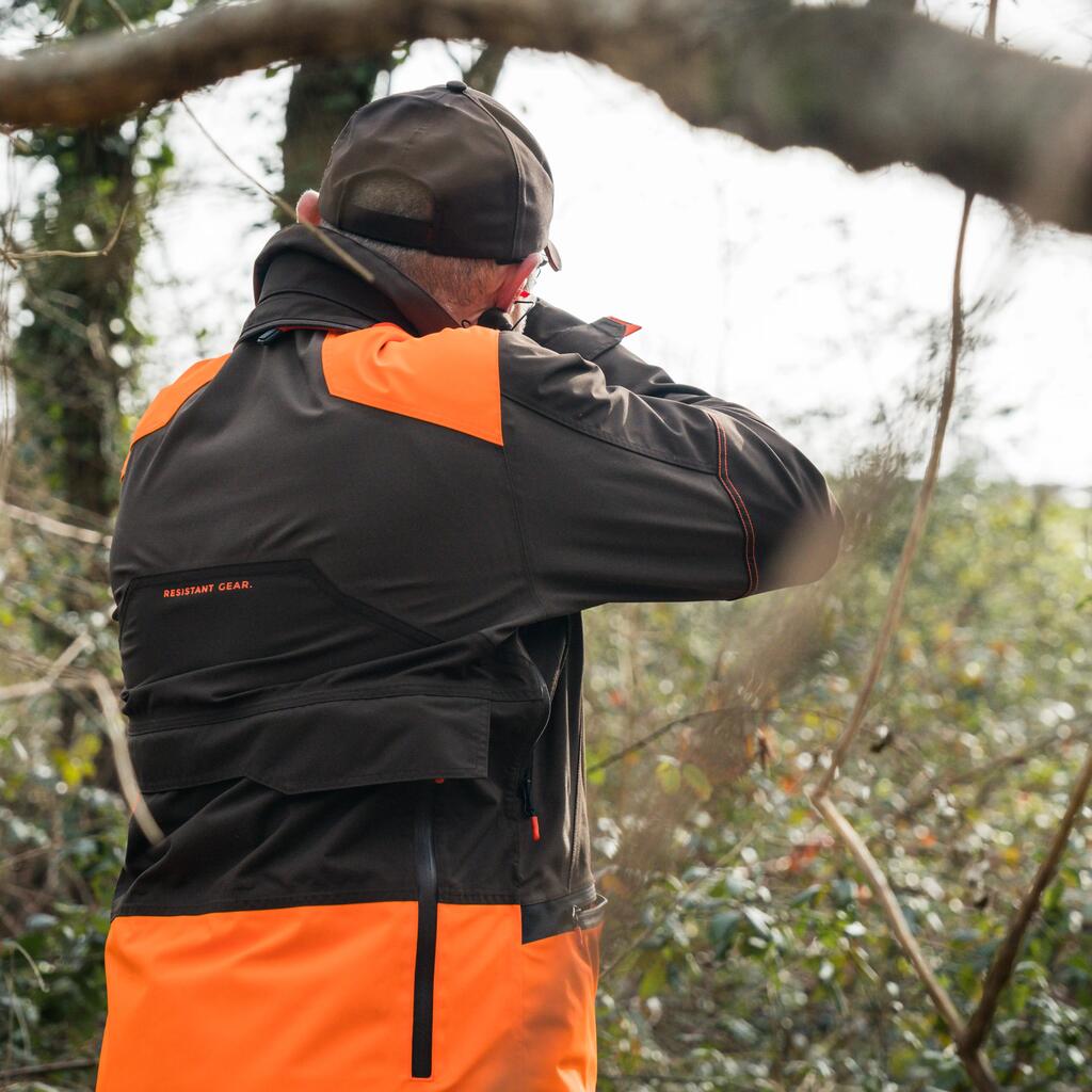 Ūdensnecaurlaidīga pastiprināta medību jaka “900” “Woodcock”, spilgti oranža
