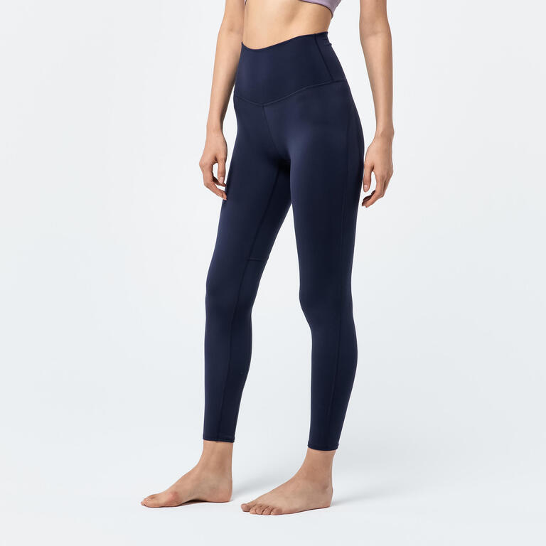 Women's navy high-waisted yoga leggings with a fitted full-length design