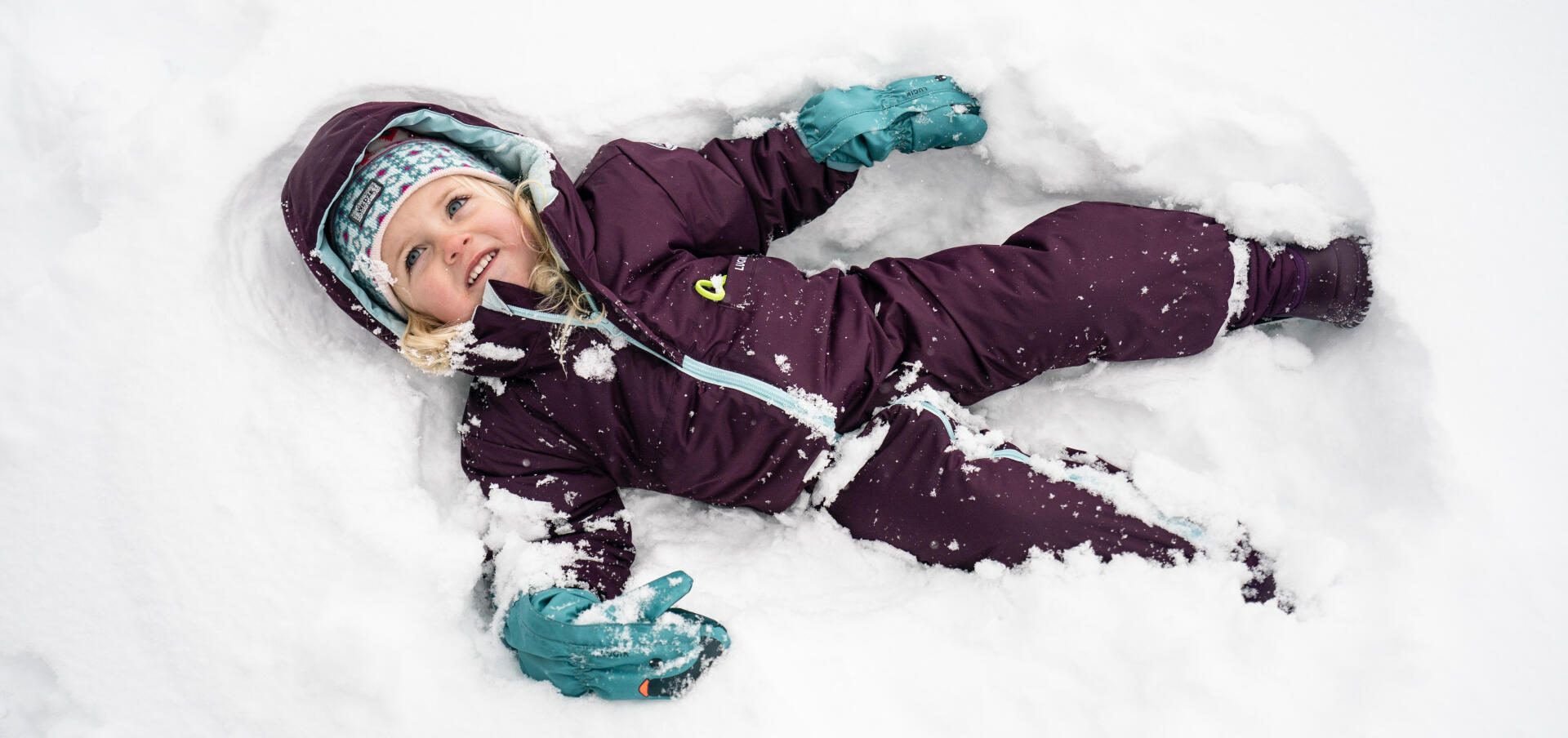 Comment j’habille mon bébé pour les sports d'hiver et la luge 