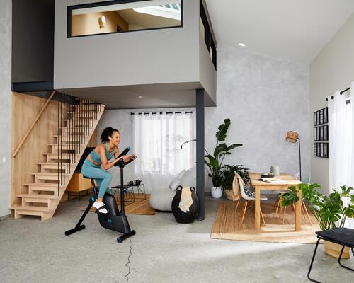 Woman on a home trainer