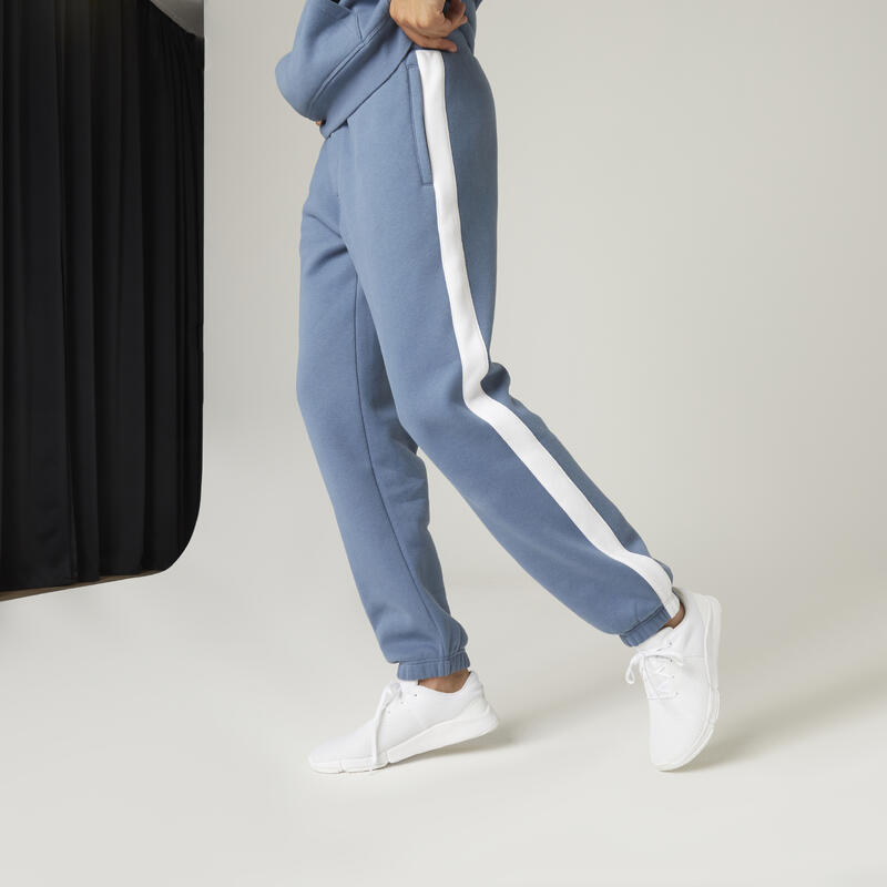 Pantaloni uomo fitness 560 regular misto cotone felpati tasca con zip blu avio