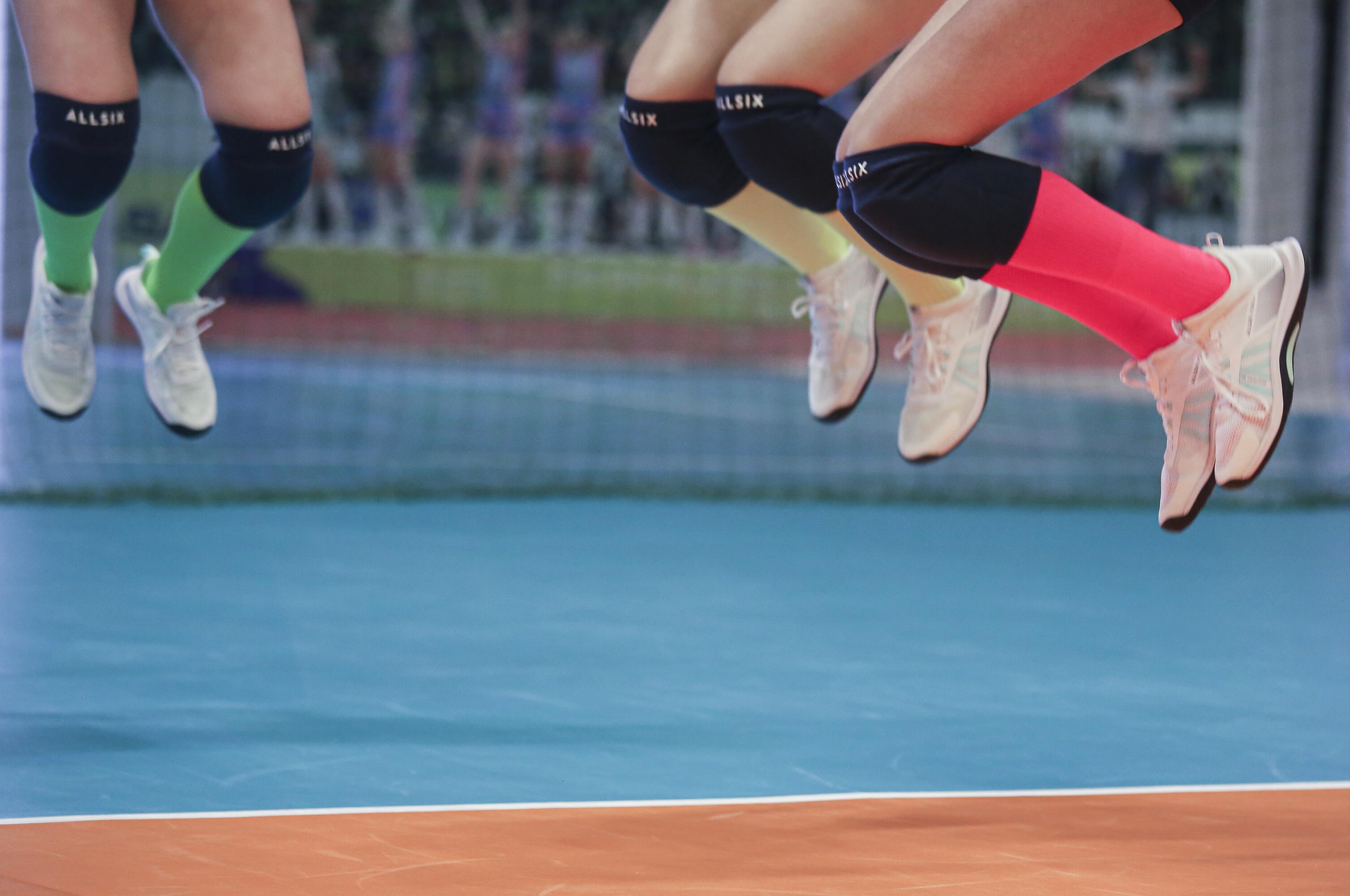 green and white volleyball shoes