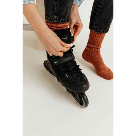 حذاء تزلج FIT100 بعجلات مصفوفة للكبار للجنسين - أسود/ نعناعي