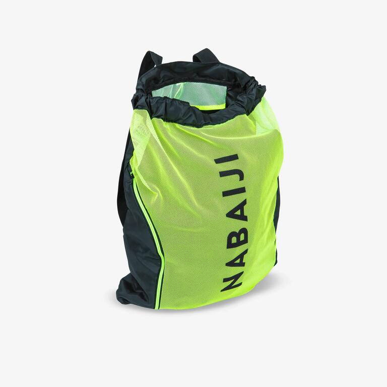 Yellow mesh pool bag worn as a backpack