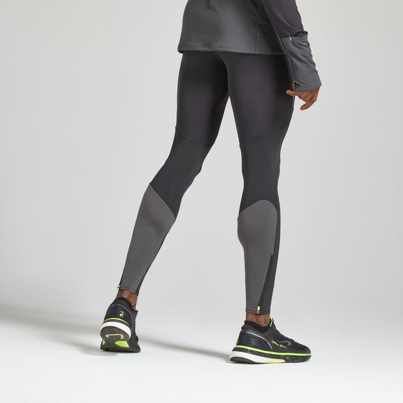Pantaloni running uomo KIPRUN WARM nero-grigio