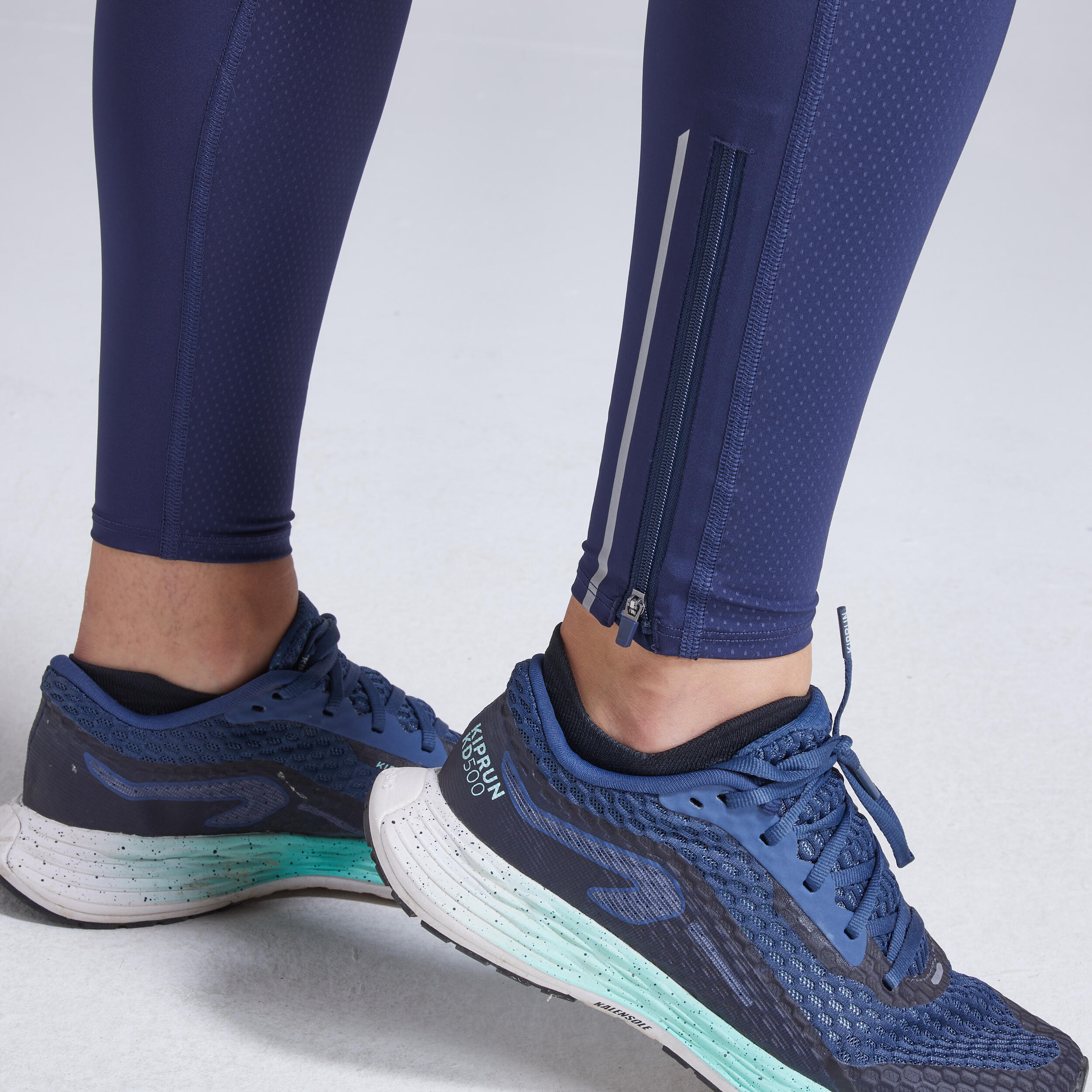 COLLANT RUNNING FEMME AVEC MAINTIEN KIPRUN SUPPORT BLEU MARINE 7/8