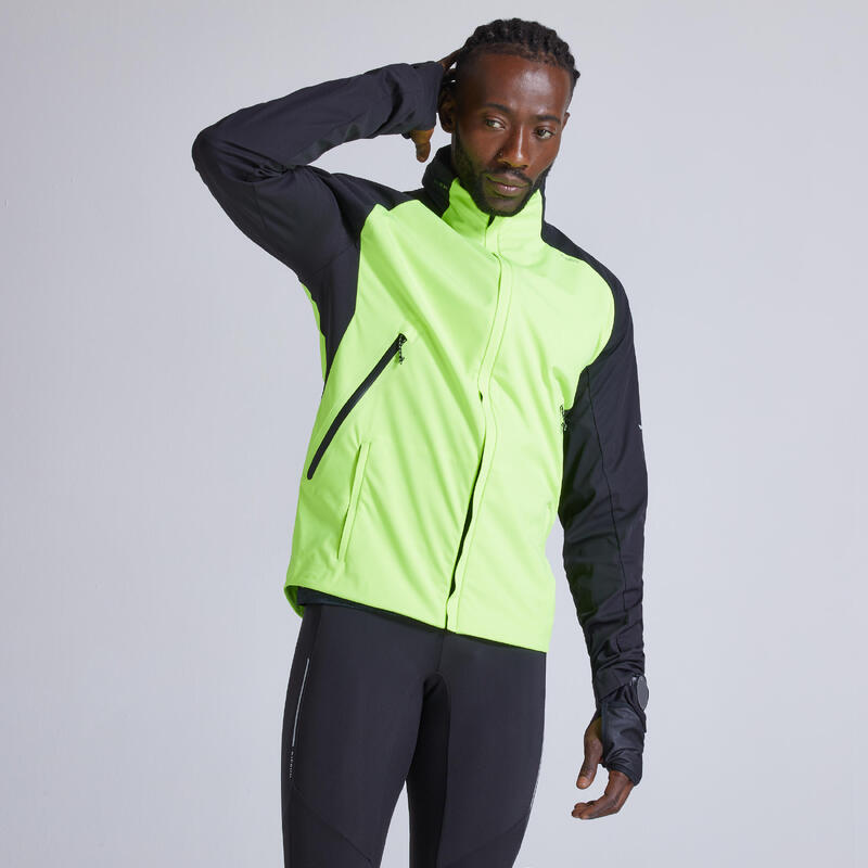 Chaqueta running Hombre cortaviento perlante Kiprun Warm negro amarillo