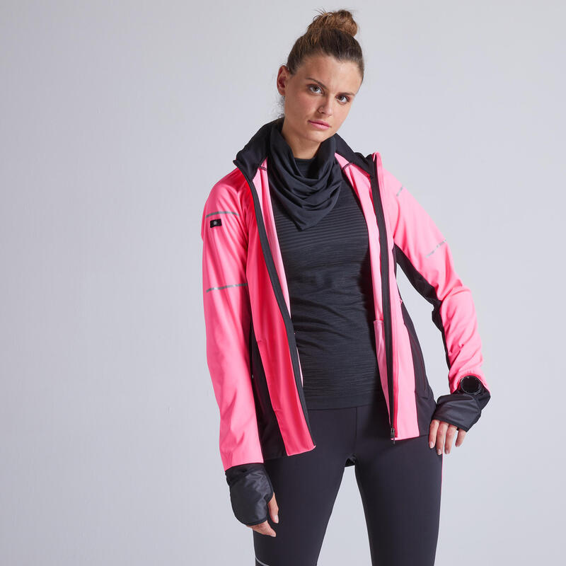 Giacca running donna KIPRUN WARM REGUL rosa fluo