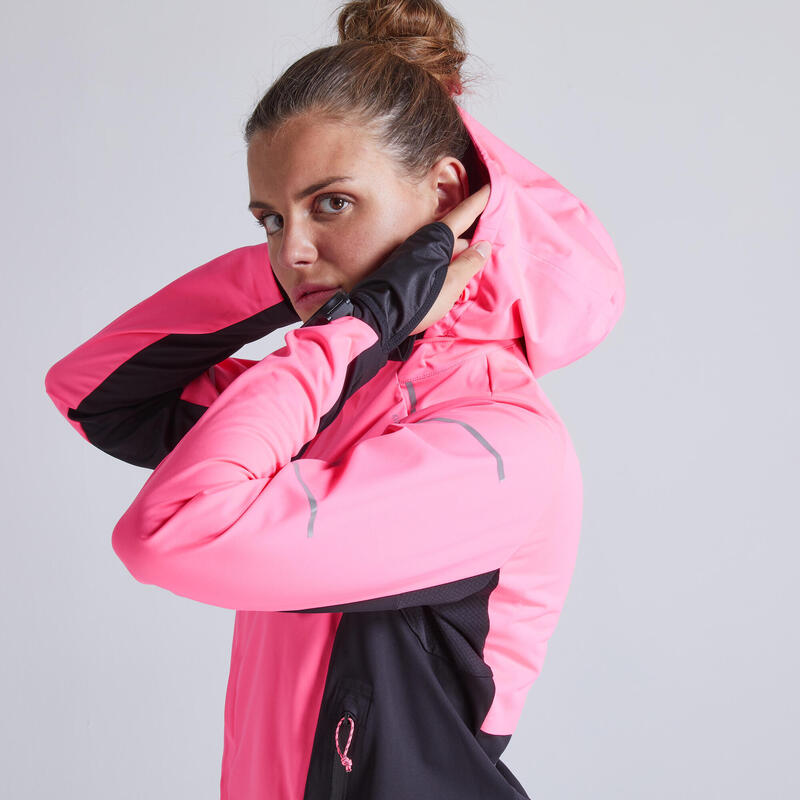 Giacca running donna KIPRUN WARM REGUL rosa fluo