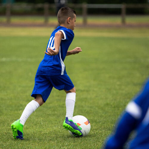 Chaussure de football enfant pour terrain sec VIRALTO III FG bleu et vert fluo