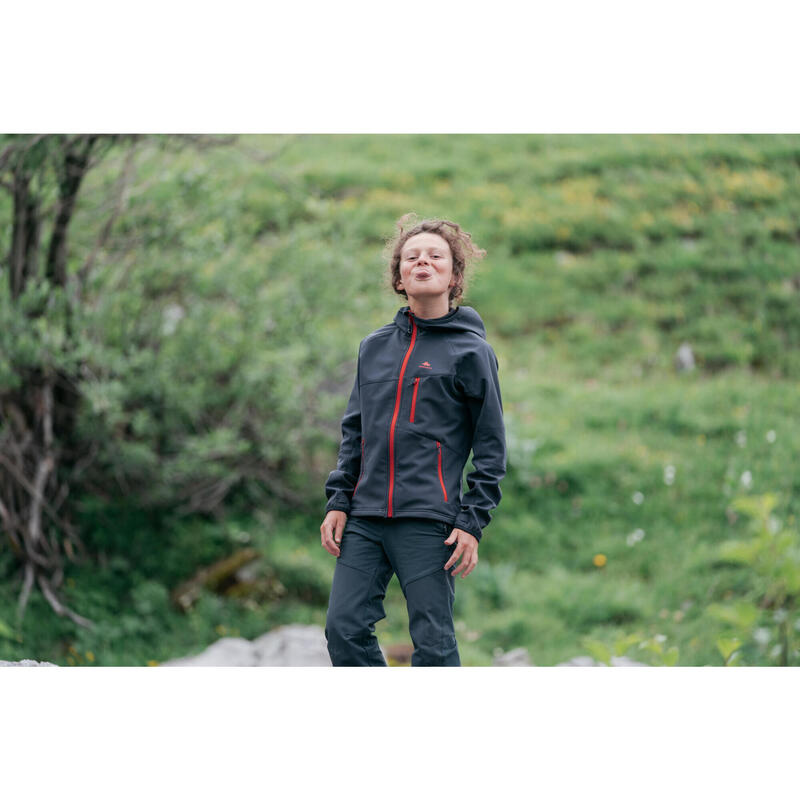 Softshell jas voor wandelen MH550 zwart rood kinderen 7-15 jaar