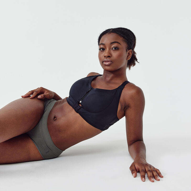 Top sportivo running donna traspirante zip frontale sostegno alto nero
