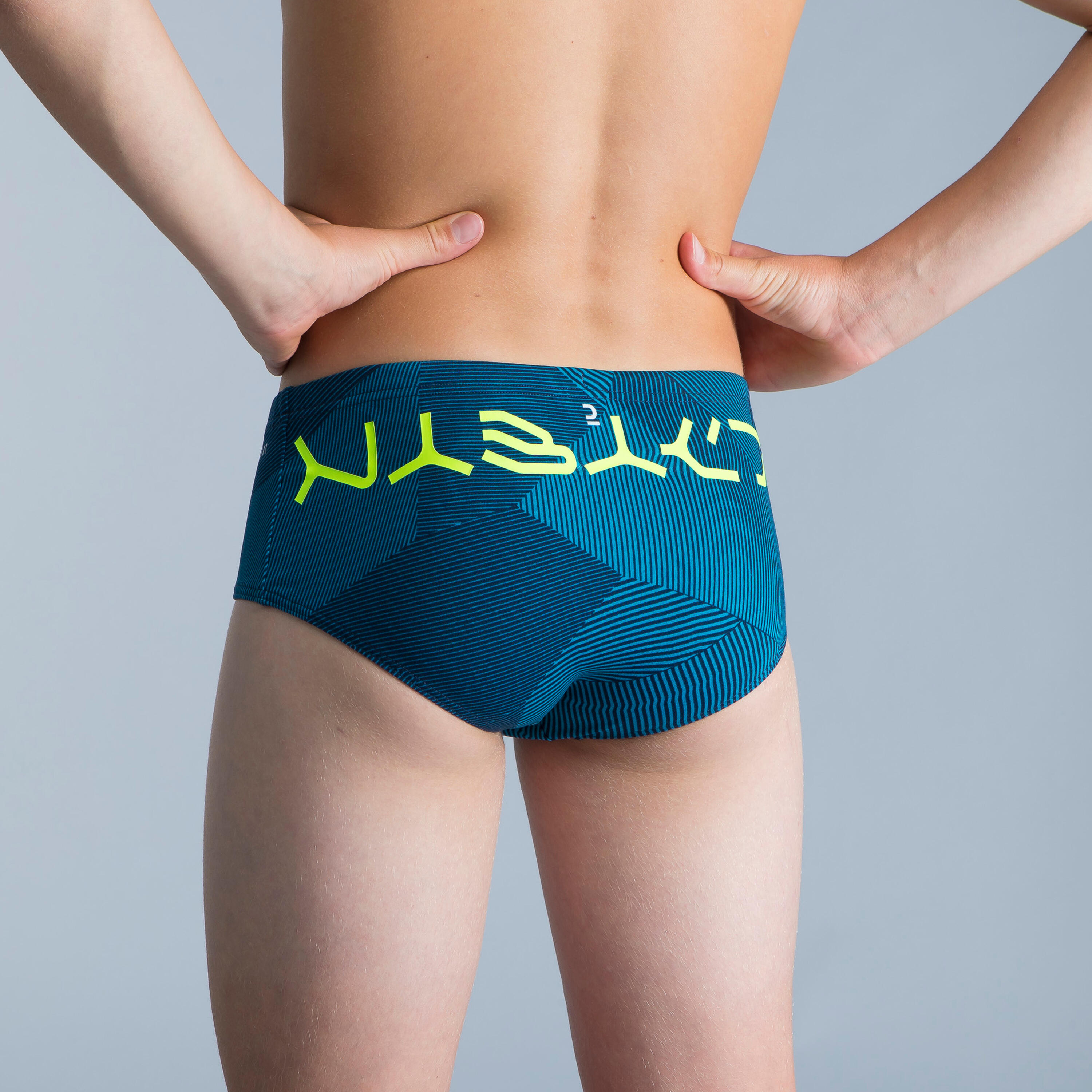 SWIMMING TRUNKS SQUARE-CUT BRIEFS 900 - LINES BLUE 3/4