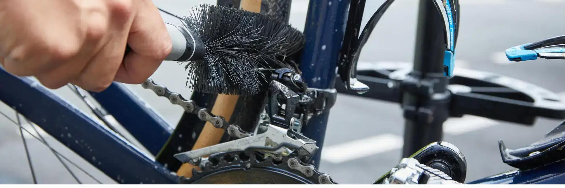 Man cleaning a bike