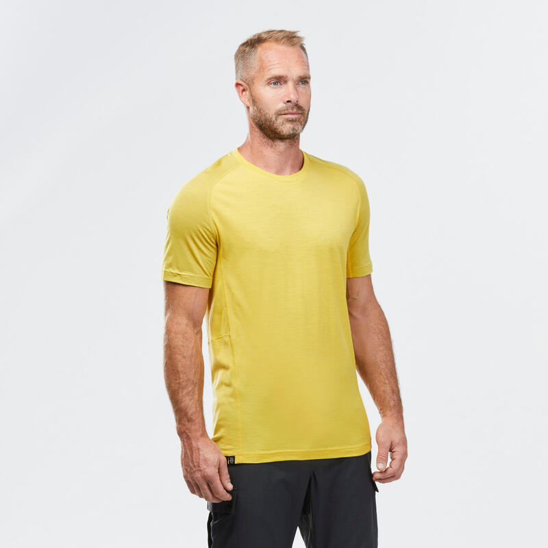 Camiseta montaña y trekking lana merina Hombre Forclaz MT500 amarillo