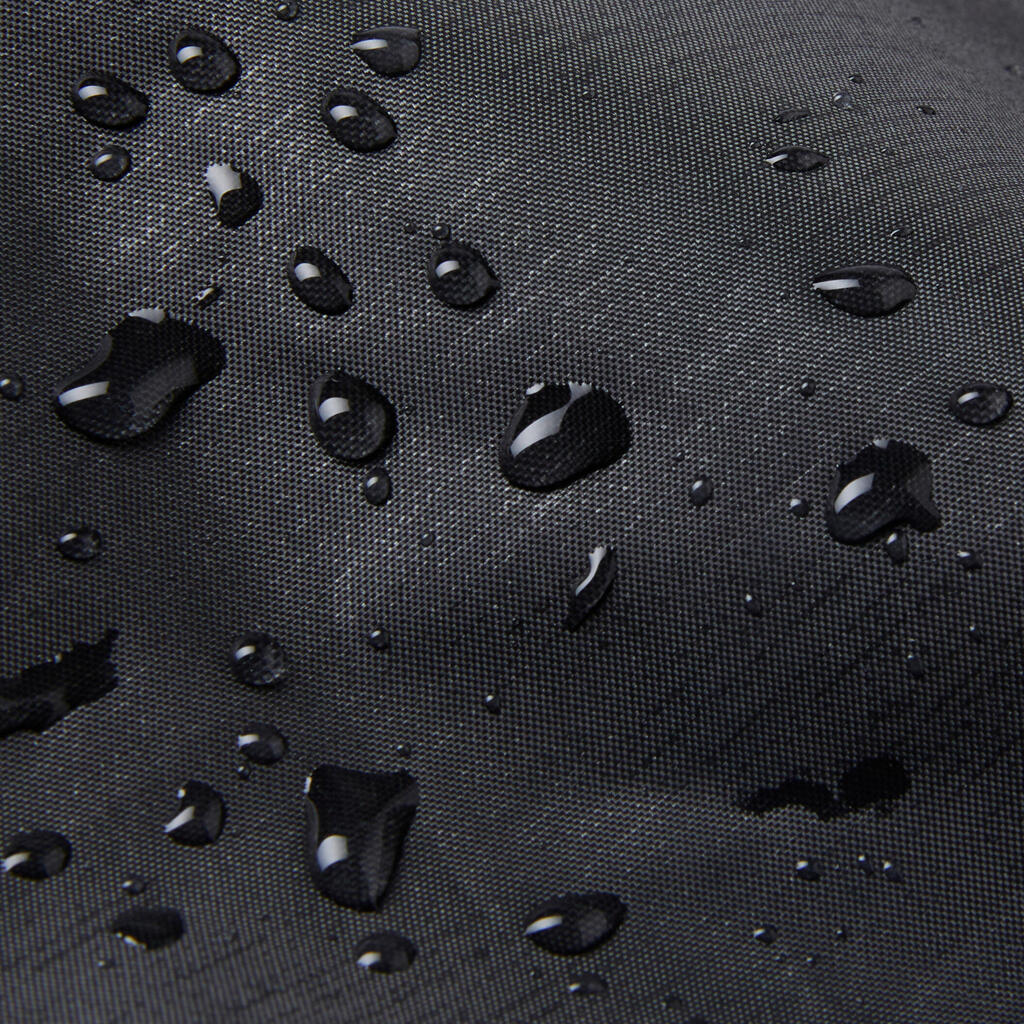 Vrchné cyklistické nohavice 100 do dažďa so všitými návlekmi čierne
