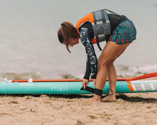 Birds-eye-view of person on SUP in sea