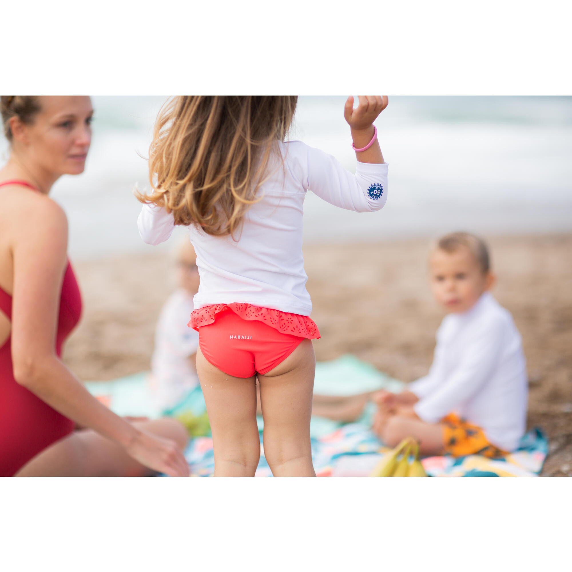 Braguita banador bebe Nina rosa coral Decathlon