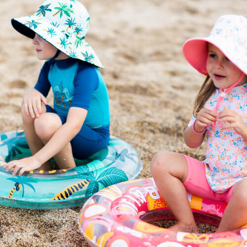 Chapeau Anti UV Bébé Réversible Rose Clair et Imprimé Fleurs