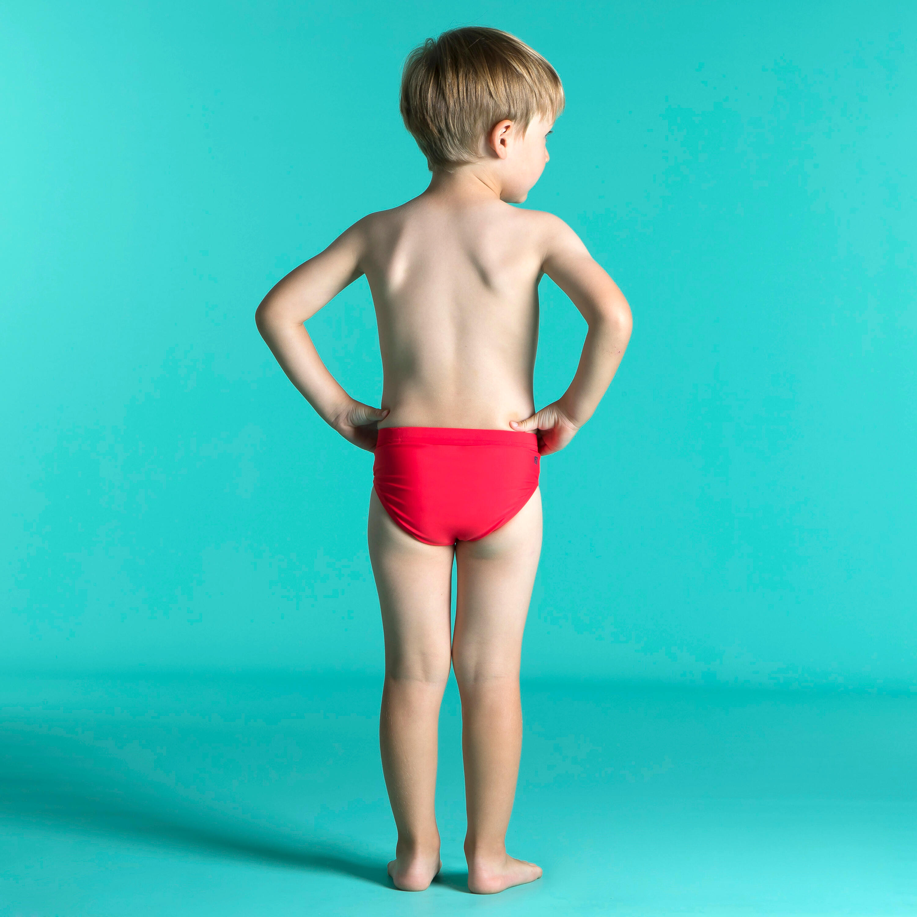Slip de bain bébé / enfant rouge 3/4