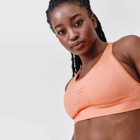 Top deportivo de Running para mujer Kalenji básico sujeción alta	naranja