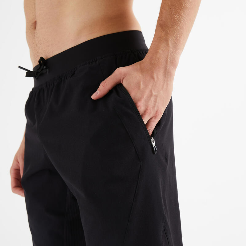 Ademende fitness short voor heren zakken met rits zwart