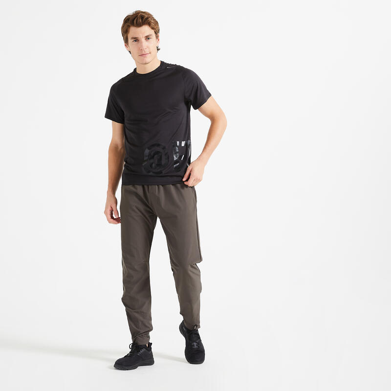 Pánské fitness tepláky 900 Slim khaki