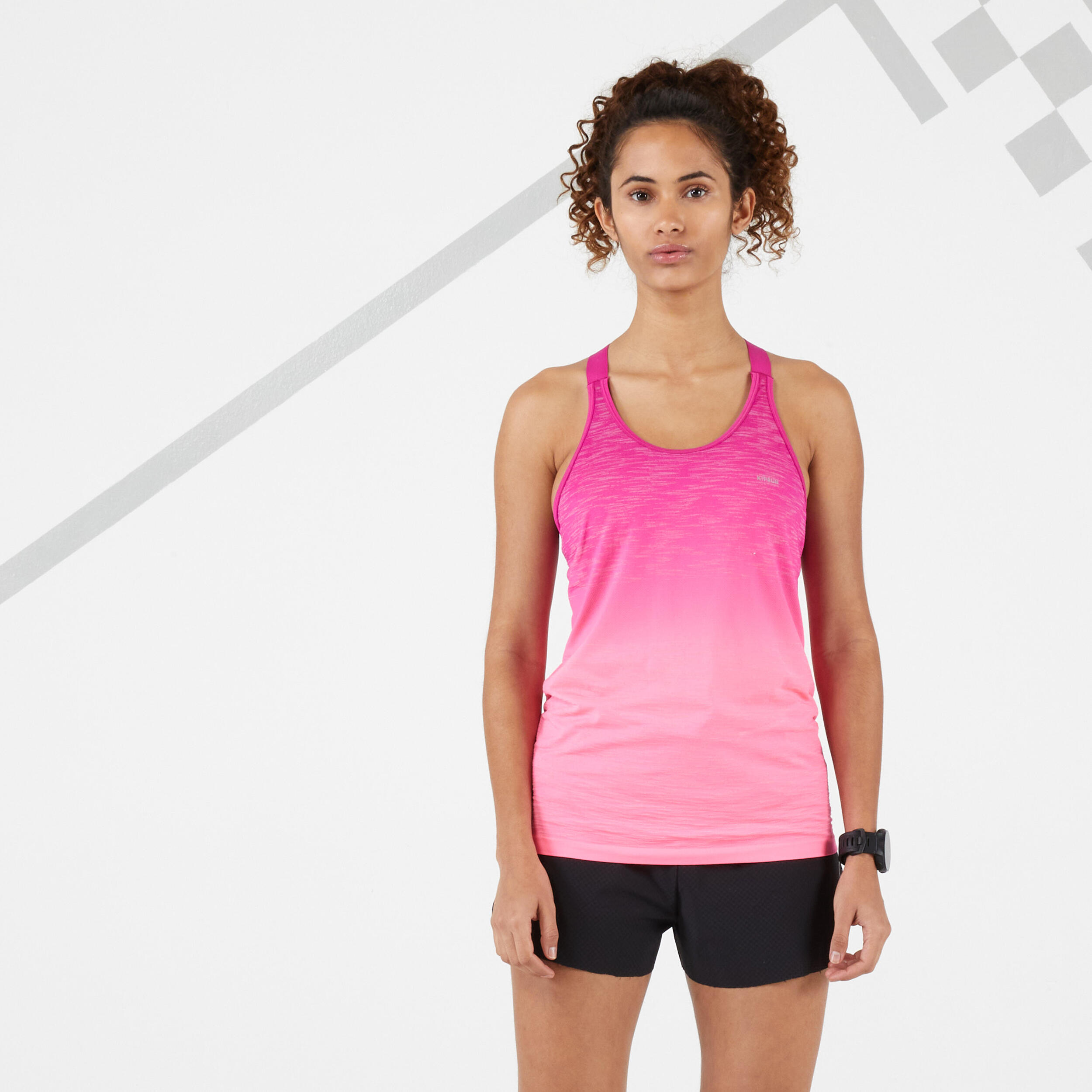 KIPRUN KIPRUN CARE RUNNING TANK TOP WITH BUILT-IN BRA - WASHED-OUT PINK