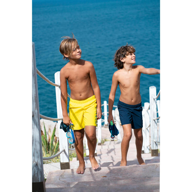 CALÇÕES CURTOS DE NATAÇÃO SWIMSHORT 100 BASIC MENINO AZUL MARINHO