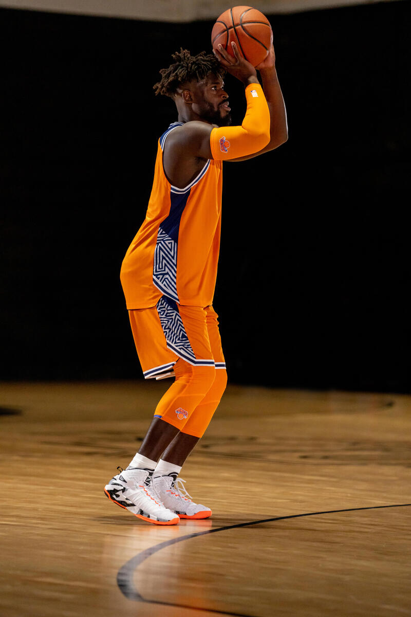 Shooting sleeve voor basketbal NBA New York Knicks E500 oranje