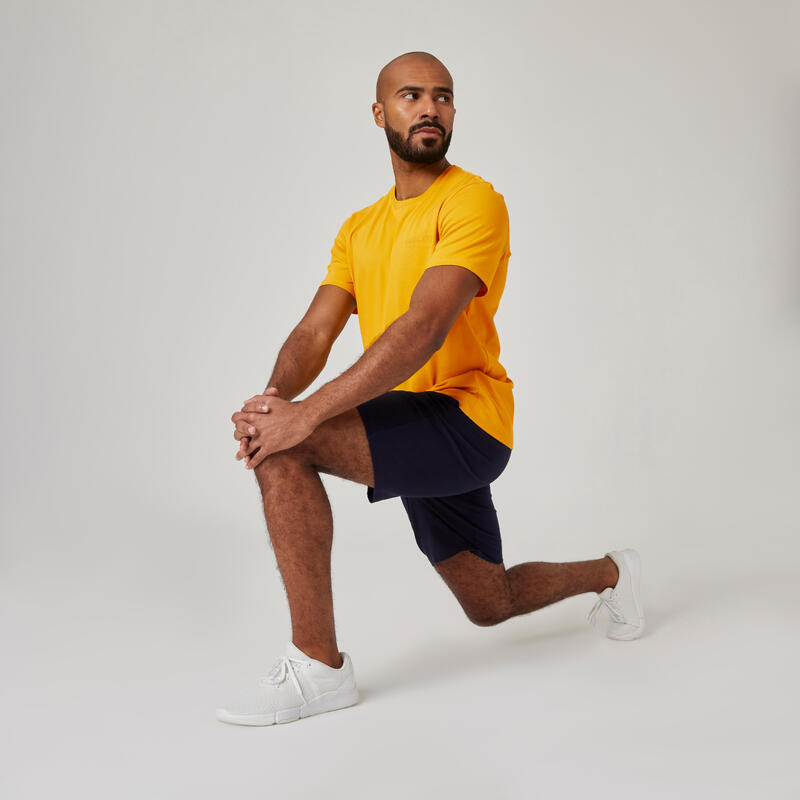 T-shirt uomo fitness 500 regular misto cotone gialla con stampa