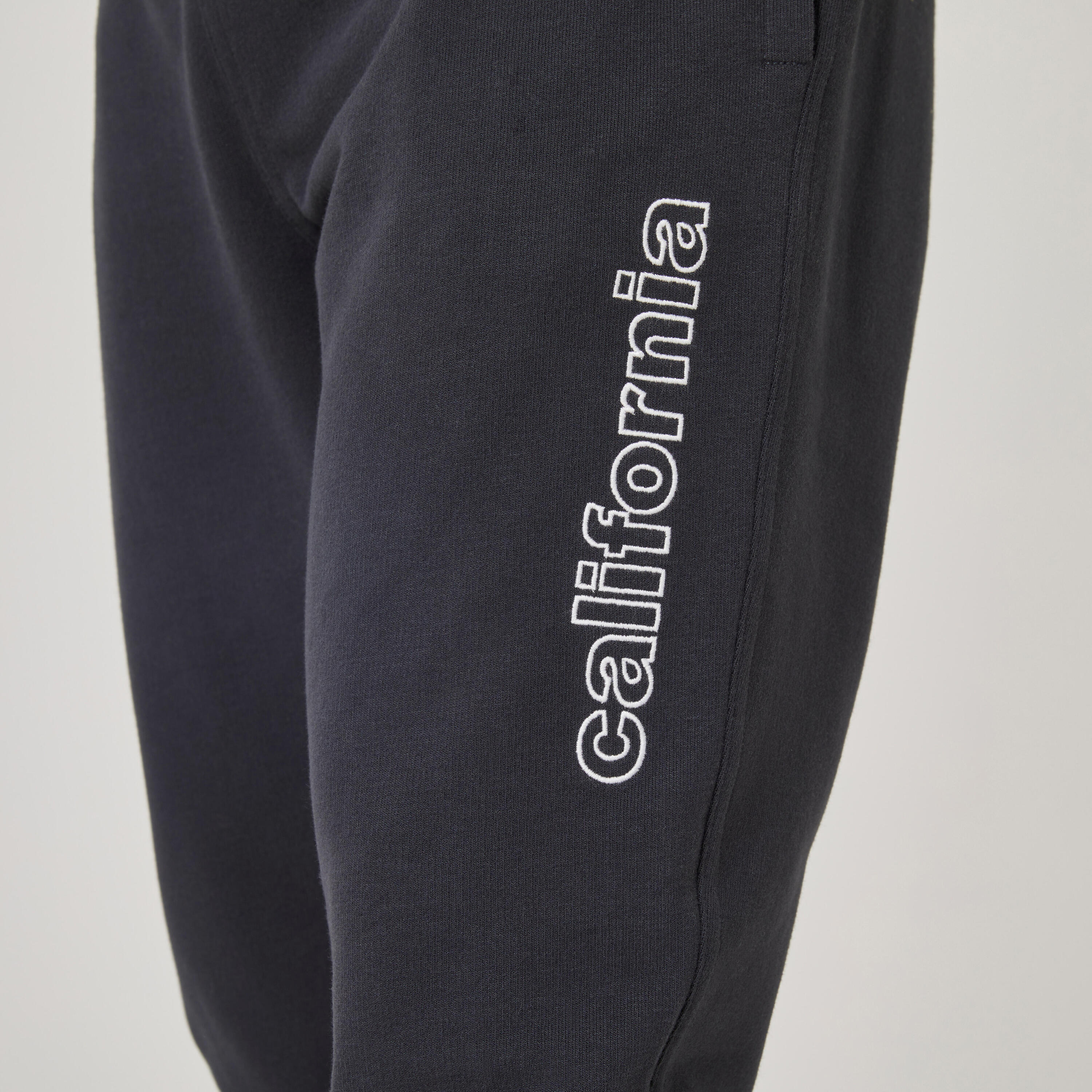 Pantaloni tuta uomo 500 slim fit felpati con tasche grigi 6/8