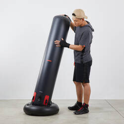 Freestanding inflatable punching bag with weightable base