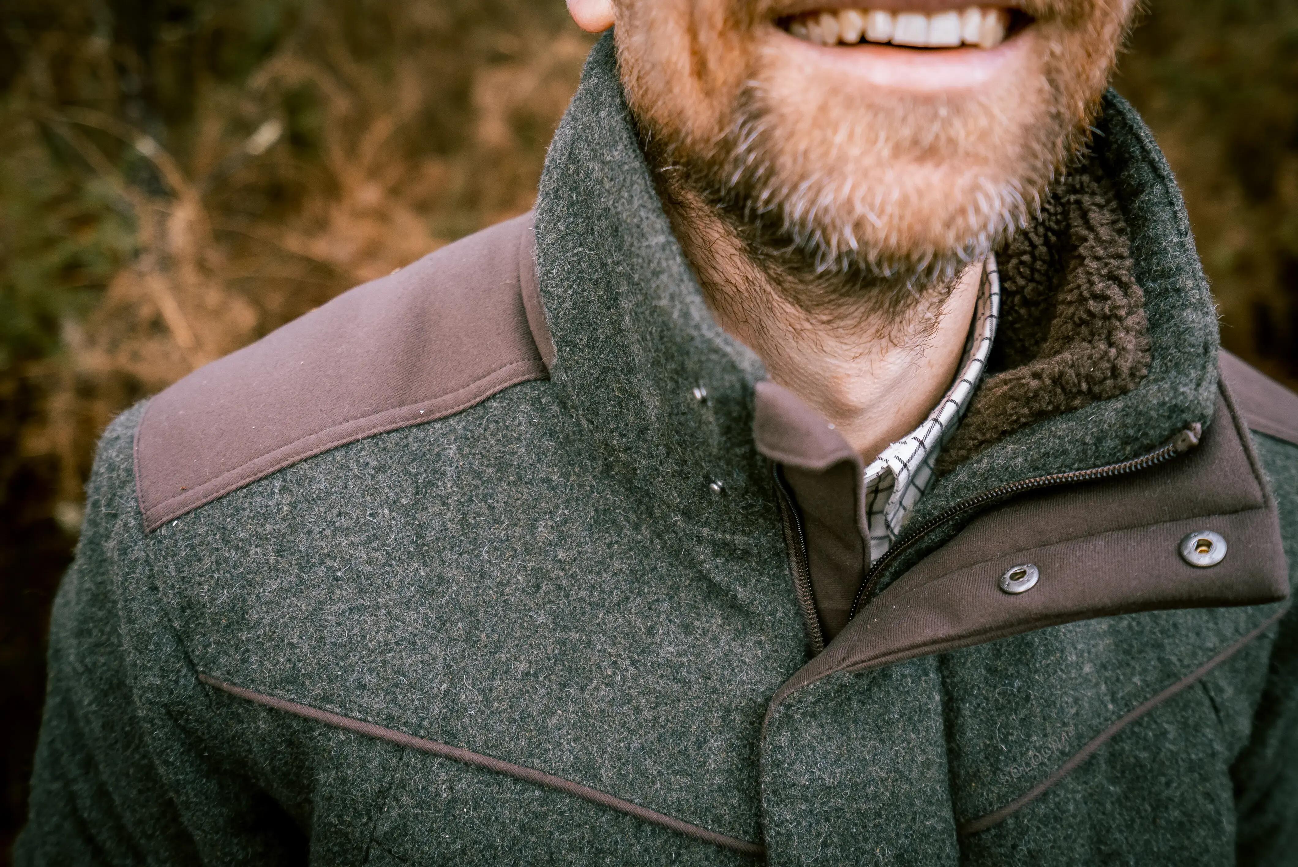 Close-up of man wearing merino wool thermals under a warm jacket outdoors
