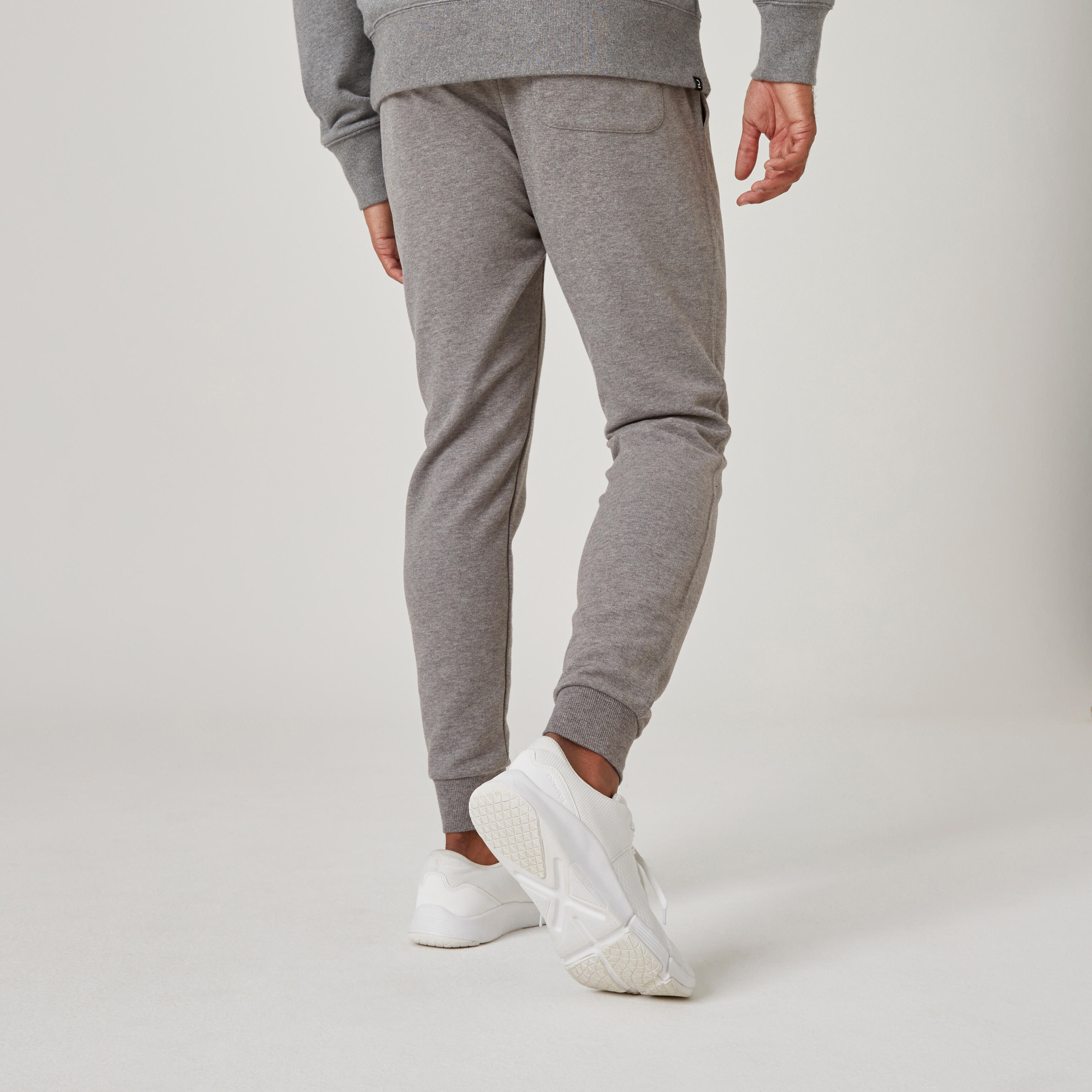 Pantal n de fitness tipo jogger de fitness de corte slim gris para hombre 500