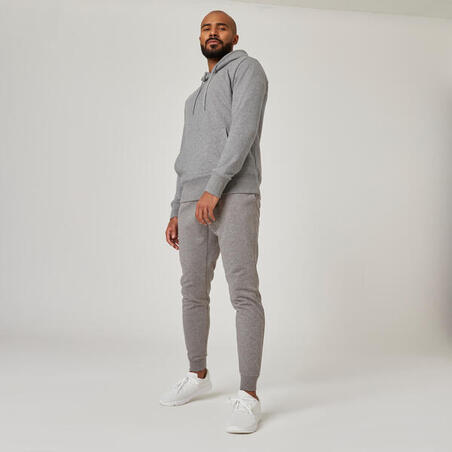 Pantalón chándal fitness algodón ajustado Hombre Domyos 500+ gris claro