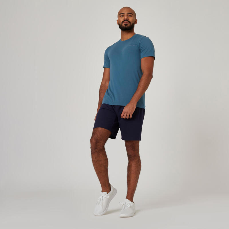 T-shirt uomo fitness 500 slim misto cotone azzurra con stampa