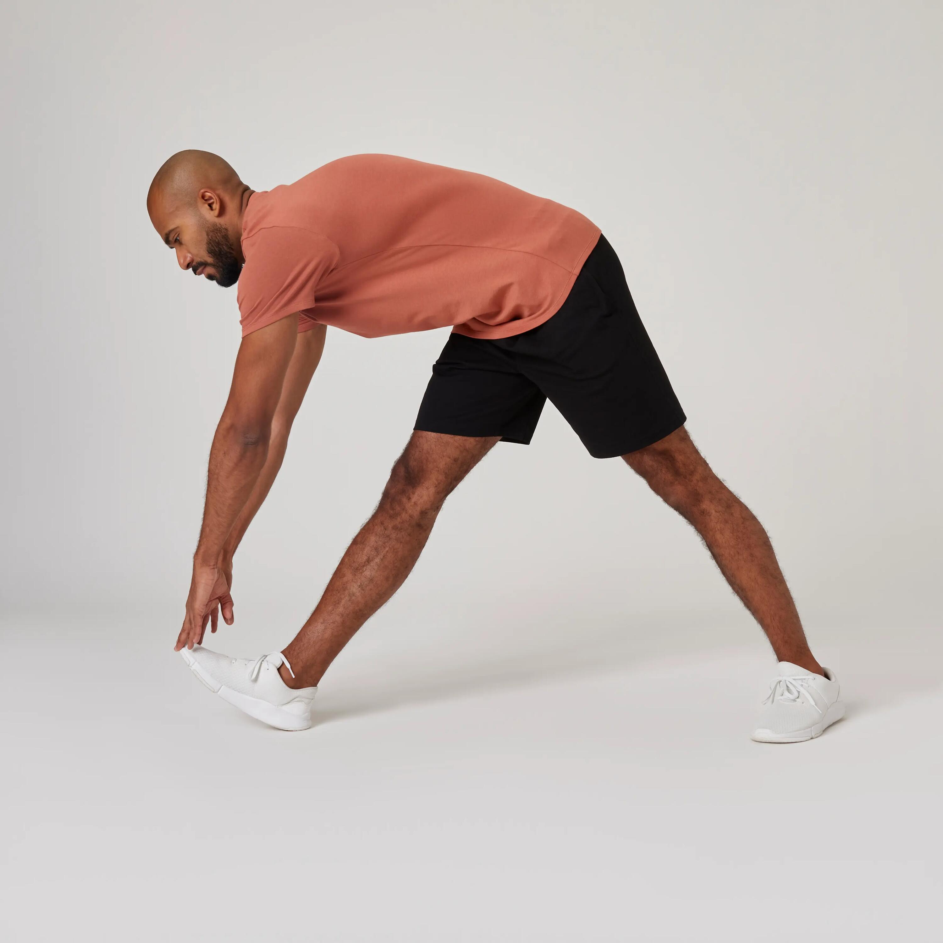 Pantaloneta de fitness con bolsillos para Hombre Domyos 500 negro 3/7