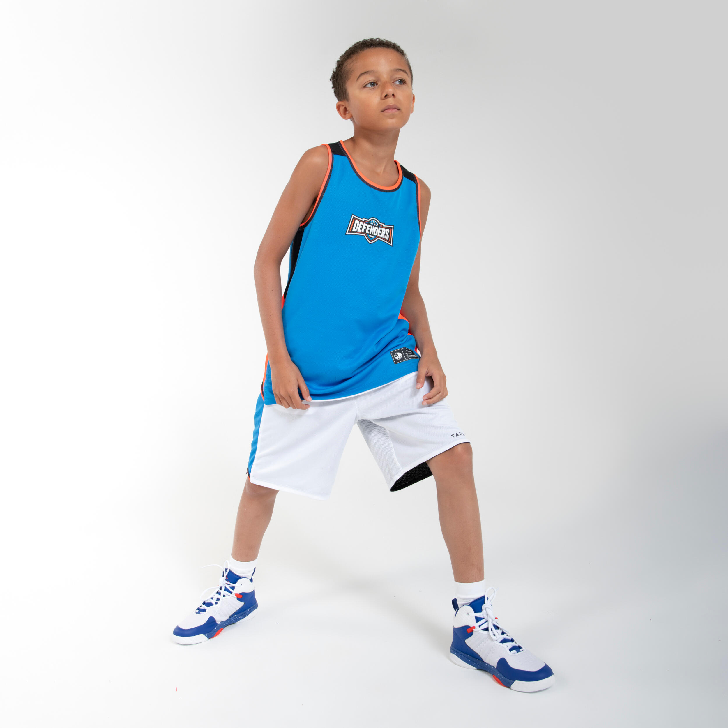 Kids' Reversible Sleeveless Basketball Jersey T500R - Blue/White/Orange 7/8