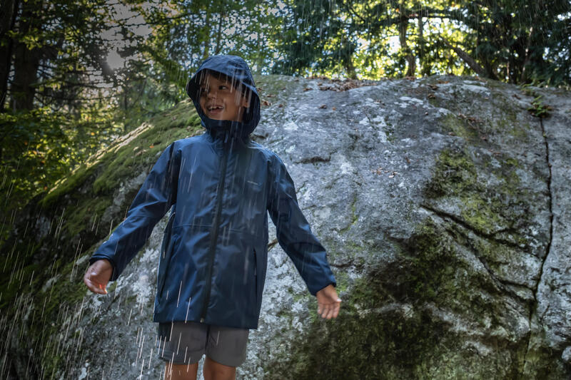Regenjas voor wandelen MH500 marineblauw kinderen 7-15 jaar