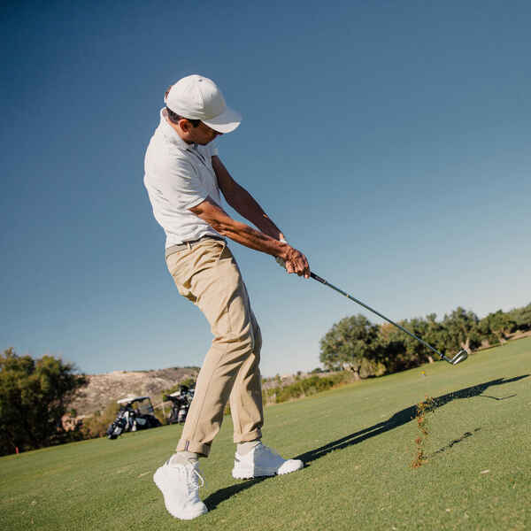 Image of person playing golf