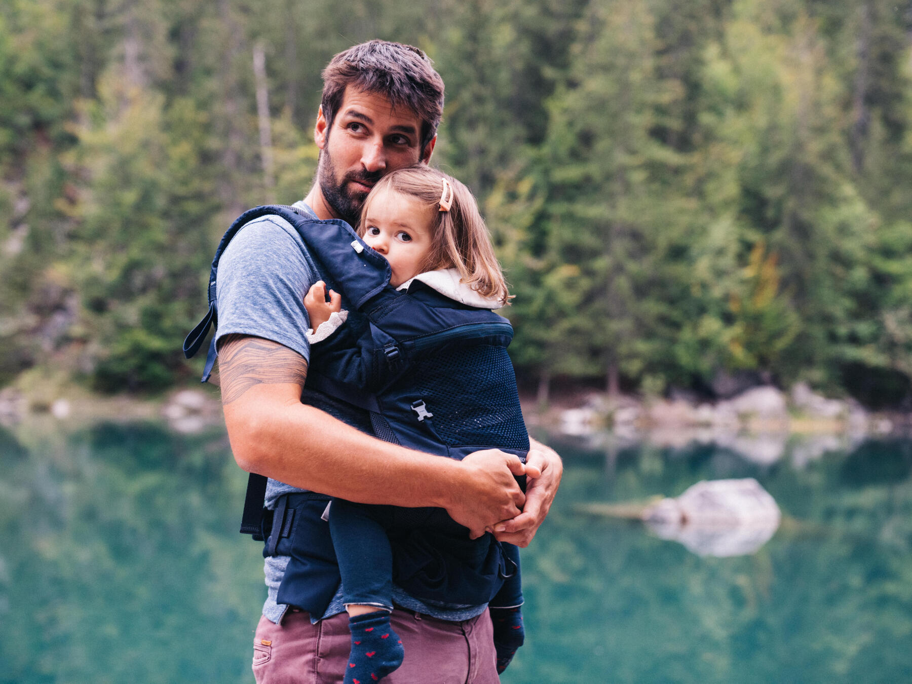 How to dress a child that is being carried during a hike?