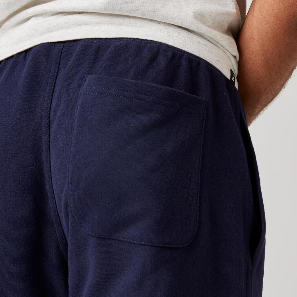 Pantalón de fitness tipo jogger de fitness de corte slim gris para hombre 500
