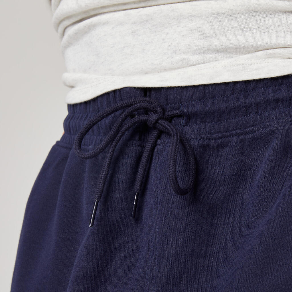 Pantalón de fitness tipo jogger de fitness de corte slim gris para hombre 500