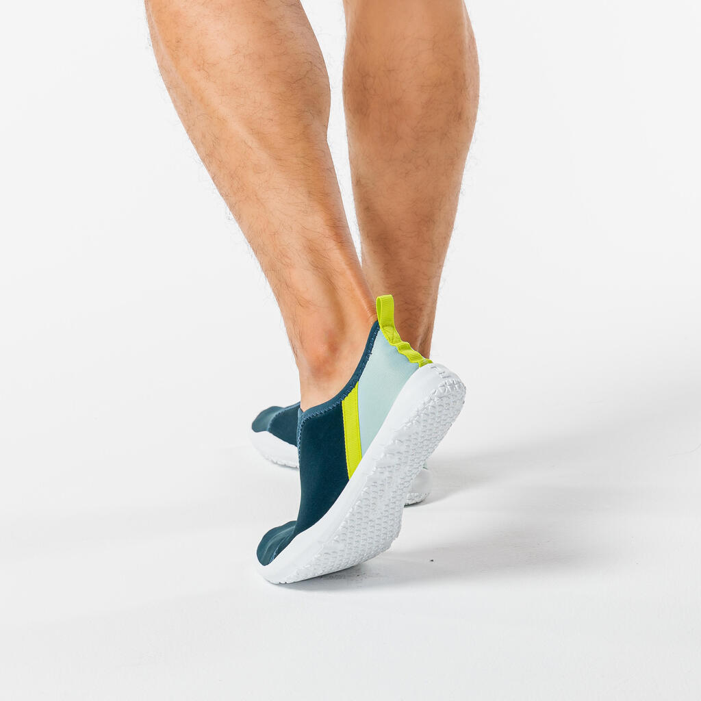 Zapatos acuáticos con elásticos naranjas para adulto Subea 120 Awake Leaf