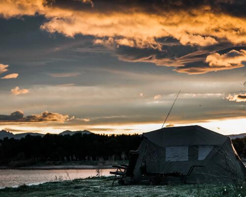 Campers looking out into the mountains