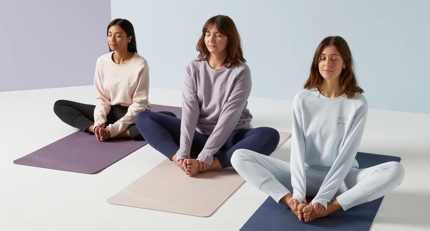 3 women meditating on their Kimjaly mats and wearing soft and comfortable Kimjaly outfits 